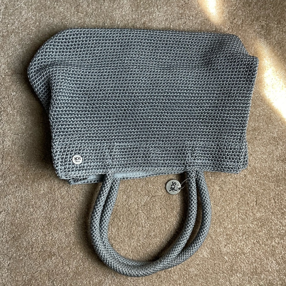 Lovely The Sak purse. Excellent condition.  MEDIUM sz. Classic Sak woven purse.